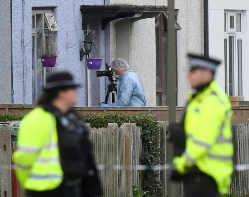 Police and forensic officers work at a property in Sunbury-on-Thames, southwest London, as part of the investigation into Friday's Parsons Green bombing, Saturday Sept, 16, 2017. British police made what they called a "significant" arrest Saturday in southern England following the partially exploded bomb attack on the London subway. ( Victoria Jones/PA via AP)