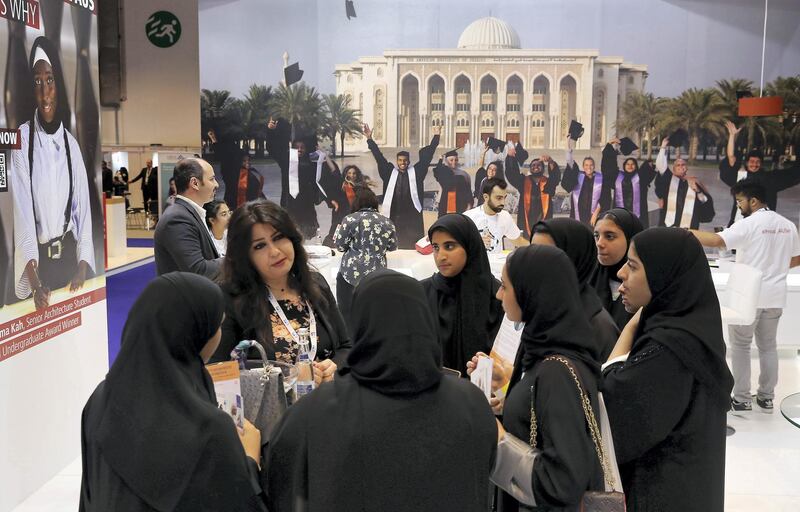 ABU DHABI, UNITED ARAB EMIRATES , October 31  – 2019 :- Students enquiring about the courses at the American University of Sharjah stand during the NAJAH higher education fair held at ADNEC in Abu Dhabi. ( Pawan Singh / The National )  For News. Story by John