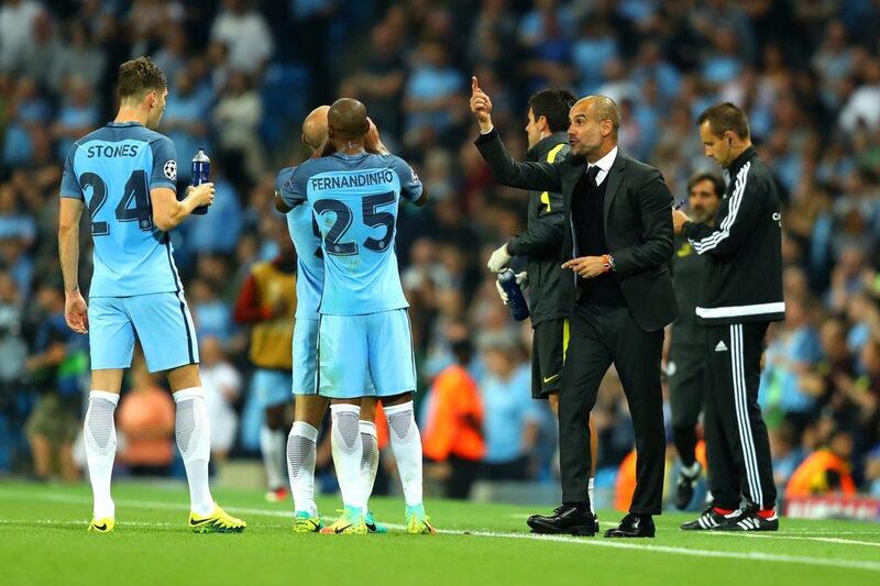 Manchester City manager Pep Guardiola issues instructions to his players during the game against Borussia Monchengladbach. The match ended 4-0 to Manchester City. Richard Heathcote / Getty Images