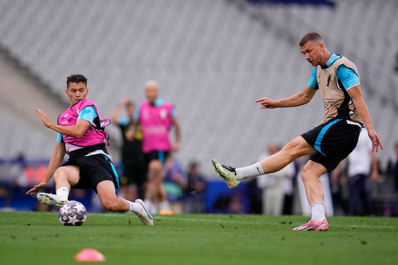 Inter Milan's Edin Dzeko plays the ball during a training session at the Ataturk Olympic Stadium in Istanbul, Turkey, on Friday, June 9, 2023. AP