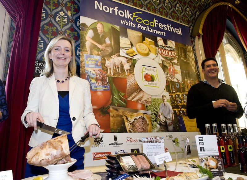 Mr Truss on the Sawnnington Farm to Fork stand at the Norfolk Food Festival at the Houses Of Parliament in  October 2011.  PA