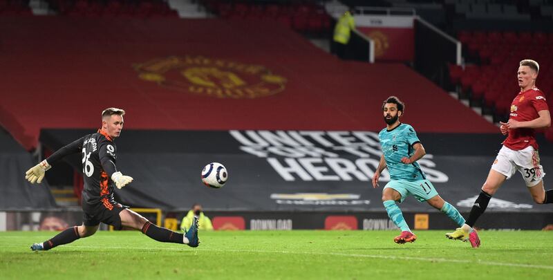 Liverpool's Mohamed Salah scores their fourth goal against Manchester United. PA