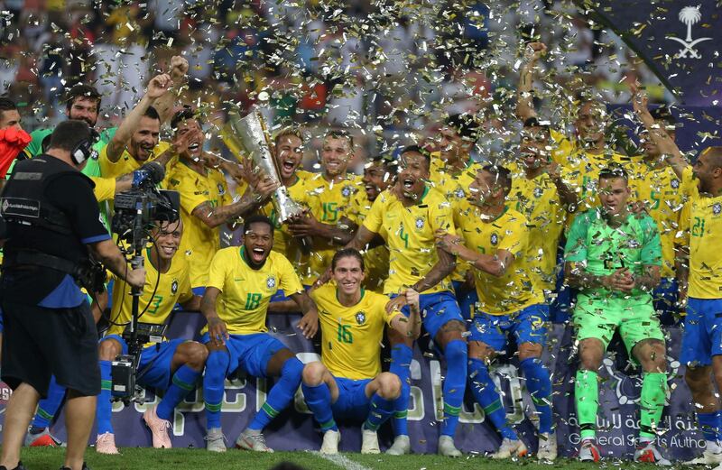Brazil players celebrate with the trophy after winning the friendly tournament staged in Saudi Arabia. AFP