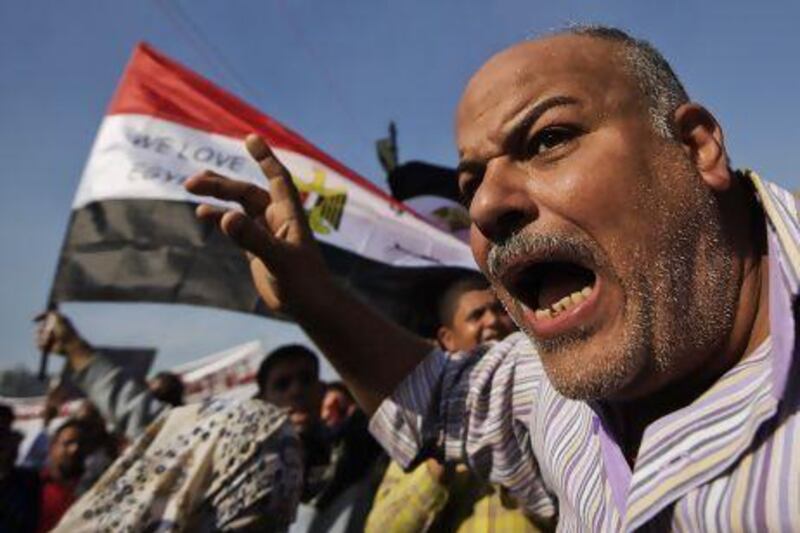 Egyptians protest against Mohammed Morsi on Friday to show their displeasure at his recents acts as president.