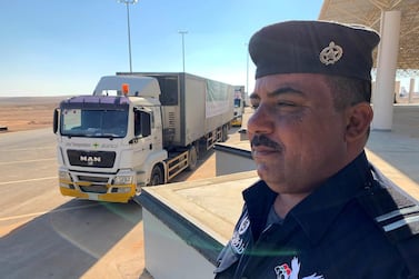 A truck carrying aid donated by Saudi Arabia makes its way into Iraq after the opening of Saudi-Iraqi border in Arar, Saudi Arabia, November 18, 2020. Reuters 