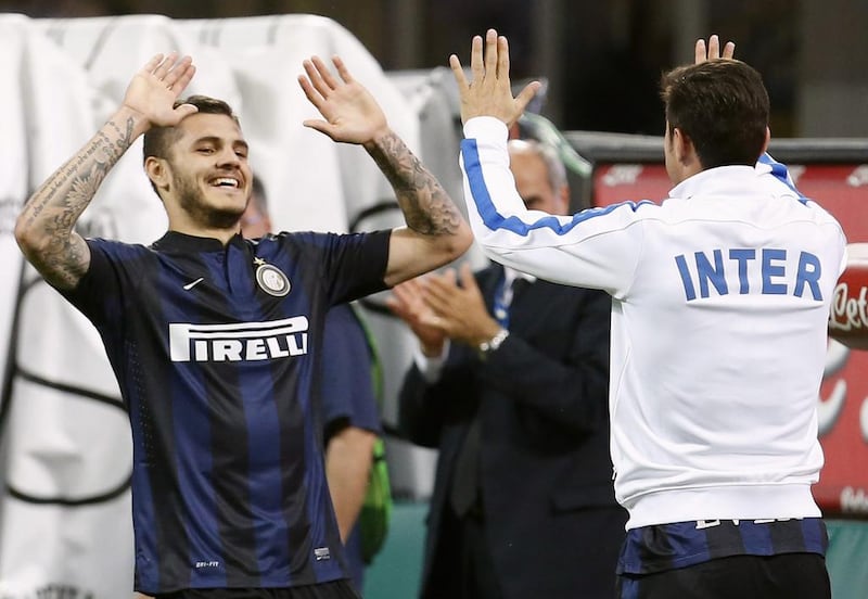 Inter were back on level terms five minutes later thanks to Rodrigo Palacio, took the lead through Mauro Icardi, left, on 34 minutes and then put the match virtually beyond all reach when Palacio completed his brace three minutes later. Alessandro Garofalo / Reuters