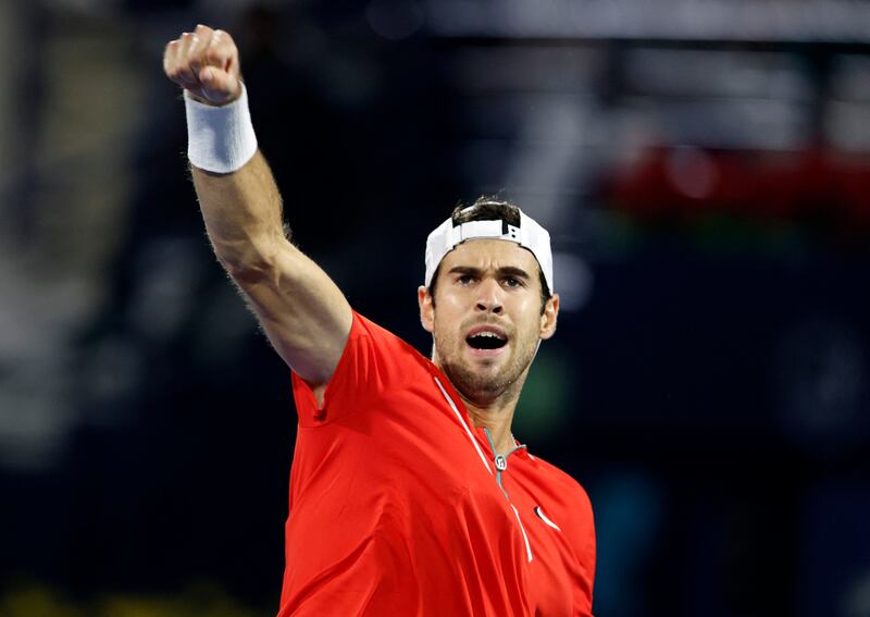 Karen Khachanov celebrates a point against Novak Djokovic. Reuters