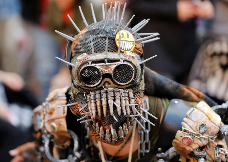 A participant in costume poses for a photo during a Halloween event in Kawasaki. EPA