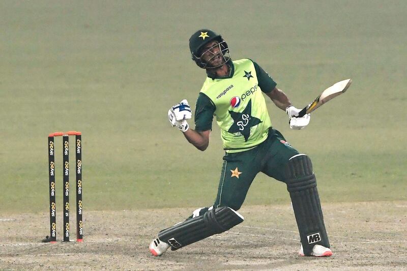 Pakistan's Hasan Ali celebrates after playing a winning shot as Pakistan won the T20 series against South Africa during the third T20 international cricket match between Pakistan and South Africa at the Gaddafi Cricket Stadium in Lahore on February 14, 2021.  / AFP / Aamir QURESHI
