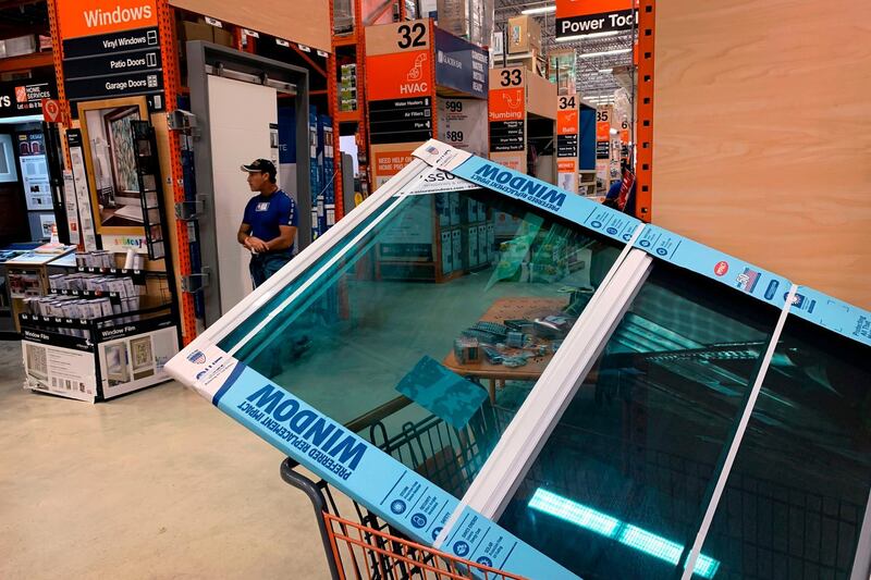 An impact window is seen inside a shopping cart at Home Depot in Miami. AFP