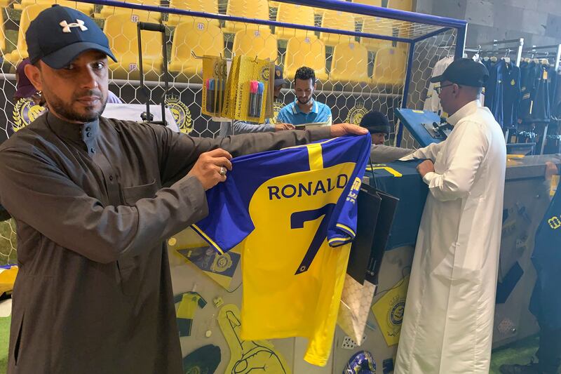 Fans in Saudi Arabia flocked to the Al Nassr club store to get a Cristiano Ronaldo jersey after the Portugal star signed a two-and-a-half year contract with the Riyadh club following the termination of his contract at Manchester United. AFP
