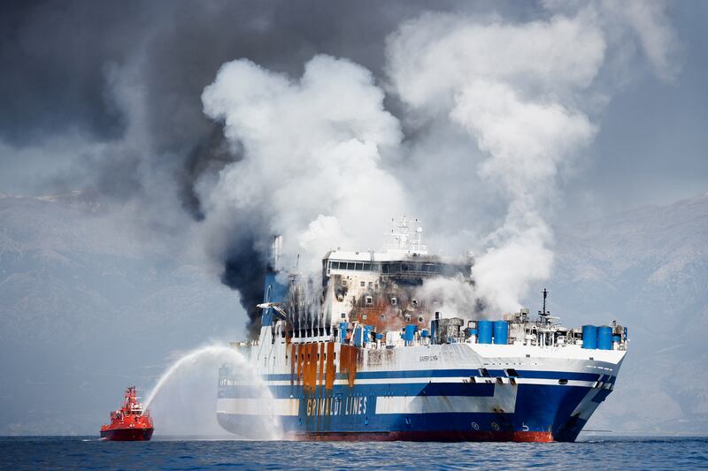 Smoke rises from the Italian-flagged 'Euroferry Olympia', which sailed from Greece to Italy early on Friday and caught fire, off the coast of Corfu, Greece. Reuters