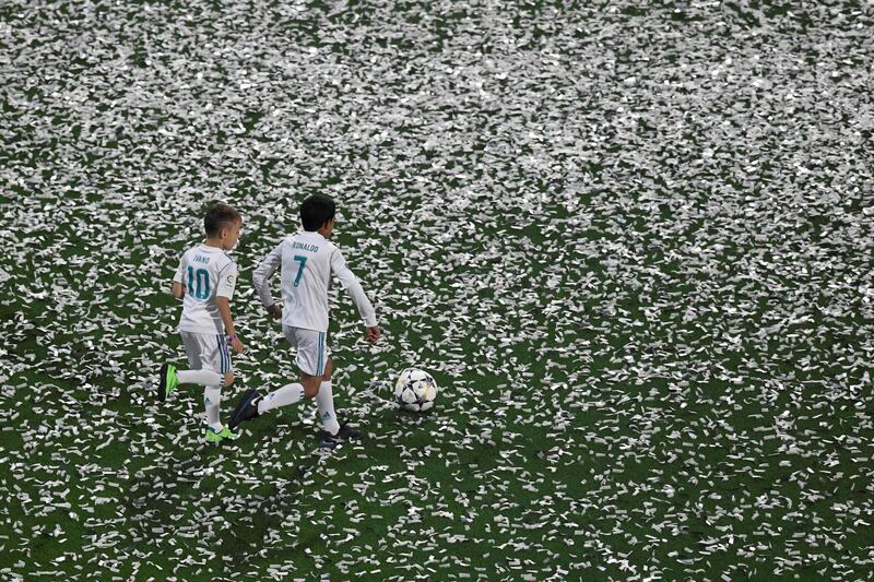 Cristiano Ronaldo´s son Cristinao and Luka Modric's son play football while Real Madrid celebrate their Champions League Final win at Santiago Bernabeu, Madrid, Spain. May 27, 2018. Gabriel Bouys / AFP