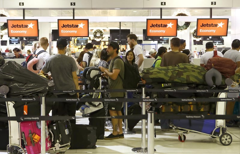 People line up to check in for international fights on Jetstar counters at Kingsford Smith International Airport in Sydney, New South Wales, Australia. All flights between Australia and Bali, Indonesia were cancelled on the day due to the ash cloud expelled by Mount Agung volcano that forced the closure of Denpasar airport. Daniel Munoz / EPA
