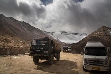 An Indian army vehicle crosses Chang La pass near Pangong Lake in Ladakh, a remote Himalayan region where Indian and Chinese soldiers have been in a bitter standoff since early May 2020. AP