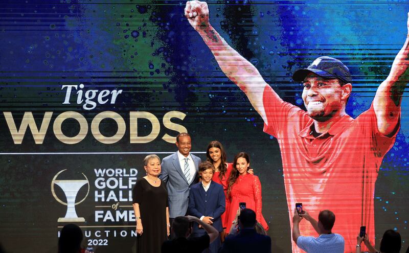 Tiger Woods, Kultida Woods, Sam Alexis Woods, Charlie Axel Woods and Erica Herman pose for a photo prior to his induction at the 2022 World Golf Hall of Fame. AFP