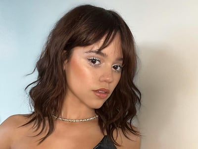 Grungecore allows the wearer to wash and go, or play around with texture and volume as they wish. Photo: @jennaortega / Instagram