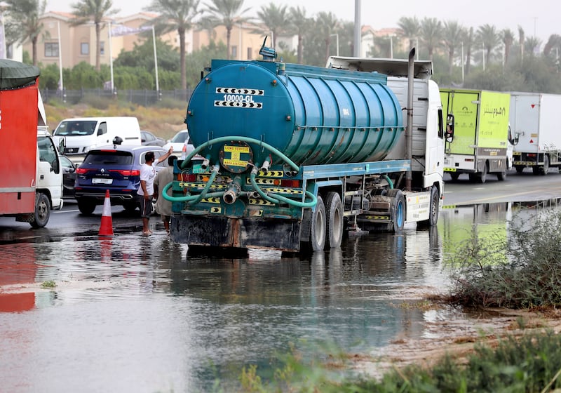 Floodwaters being cleared on Al Qudra Road, Dubai. Chris Whiteoak / The National