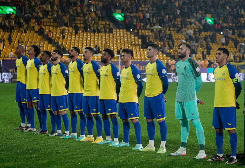Al Nassr players before the match against Ta'ee. AP