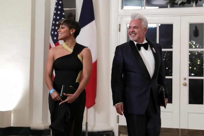 Actress Ariana DeBose and designer Henry Munoz III arrive at the White House. Reuters