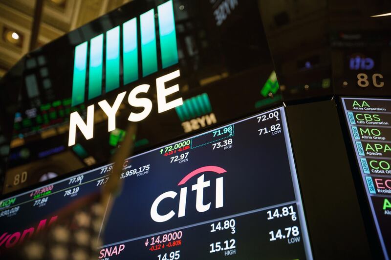 A monitor displays Citigroup Inc. signage on the floor of the New York Stock Exchange (NYSE) in New York, U.S., on Friday, April 13, 2018. U.S. stocks gave up earlier gains and turned lower as investors assessed positions ahead of the weekend with trade uncertainty and tension in the Middle East hanging over financial markets. The dollar fell with Treasury yields and oil rose for fifth straight day. Photographer: Michael Nagle/Bloomberg