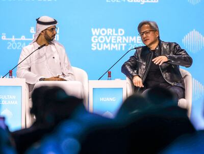 Omar Al Olama, Minister of State for AI, Digital Economy and Remote Work Applications, discusses AI with Jensen Huang, chief executive of the Nvidia Corporation, at the World Governments Summit in Dubai. Victor Besa / The National