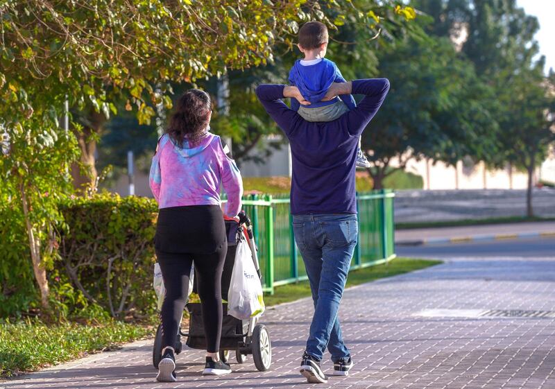 Abu Dhabi, United Arab Emirates, January 19, 2021.  Al Reef Village in Abu Dhabi. Parents take their children for an afternoon stroll.
Victor Besa/The National 
Section:  NA
Reporter:  Gillian Duncan