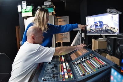 Ms Prodaevich spends time with her tech team to ensure that the visual concerts are ready. Shruti Jain / The National 