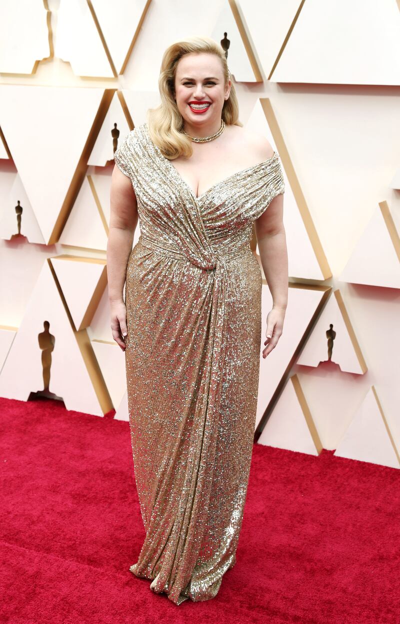 Rebel Wilson, wearing gold sequinned Jason Wu, arrives for the 92nd Academy Awards ceremony at the Dolby Theatre in Hollywood on February 9, 2020. EPA