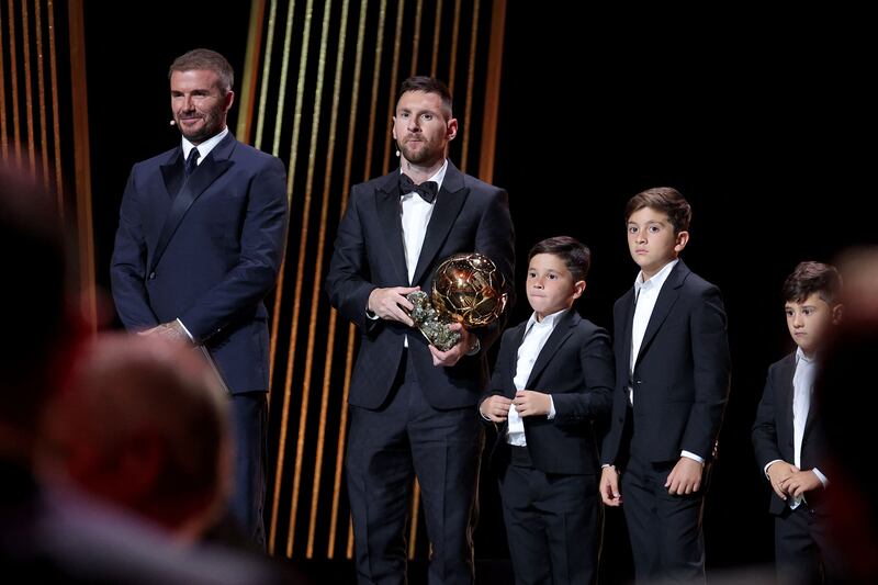 Inter Miami forward Messi on stage with his children and team co-owner David Beckham at the Theatre du Chatelet in Paris. AFP