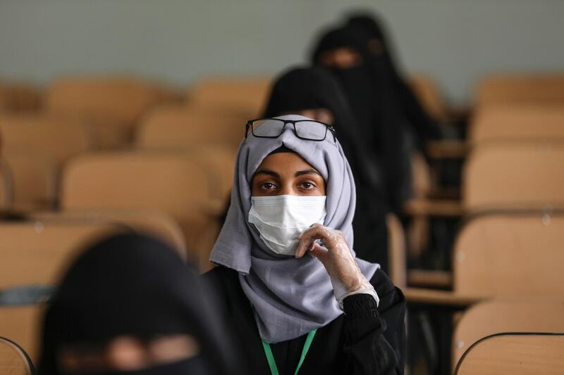 A volunteer for a coronavirus awareness campaign seen in Sanaa, Yemen. Reuters