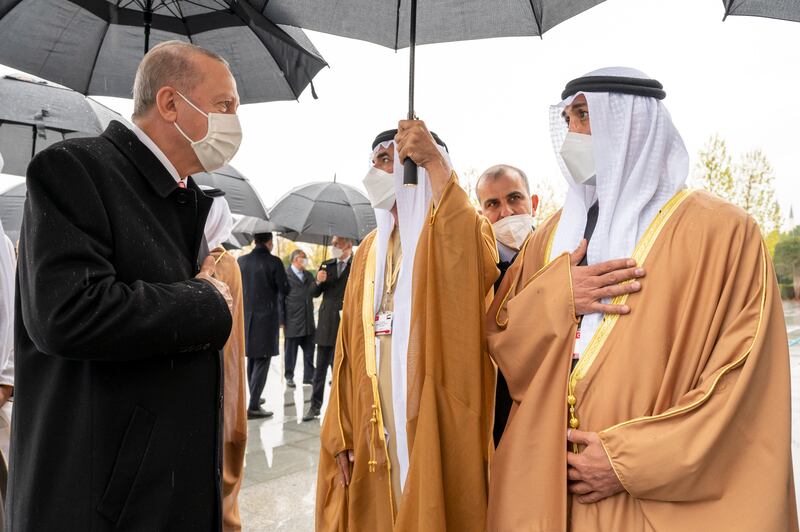 Mohamed Al Mazrouei, Undersecretary of the Crown Prince Court of Abu Dhabi, greets Mr Erdogan. Mohamed Al Hammadi / Ministry of Presidential Affairs