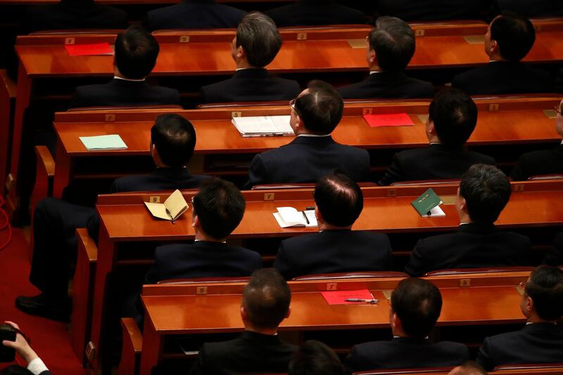 Attendees listen to Chinese President Xi Jinping's speech during an anniversary event celebrating the 200th year of the birth of Karl Marx at the Great Hall of the People in Beijing, China. Xi also instructed all party members to adopt the reading of Marxist works and the understanding of Marxist theories as a "way of life" and a "spiritual pursuit". How Hwee Young / EPA