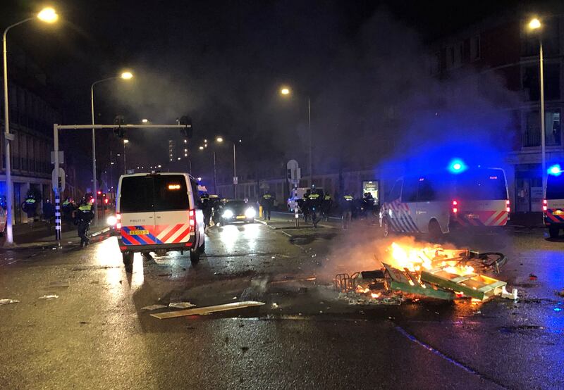 Protesters in The Hague express their anger at the Dutch government's coronavirus measures. AFP