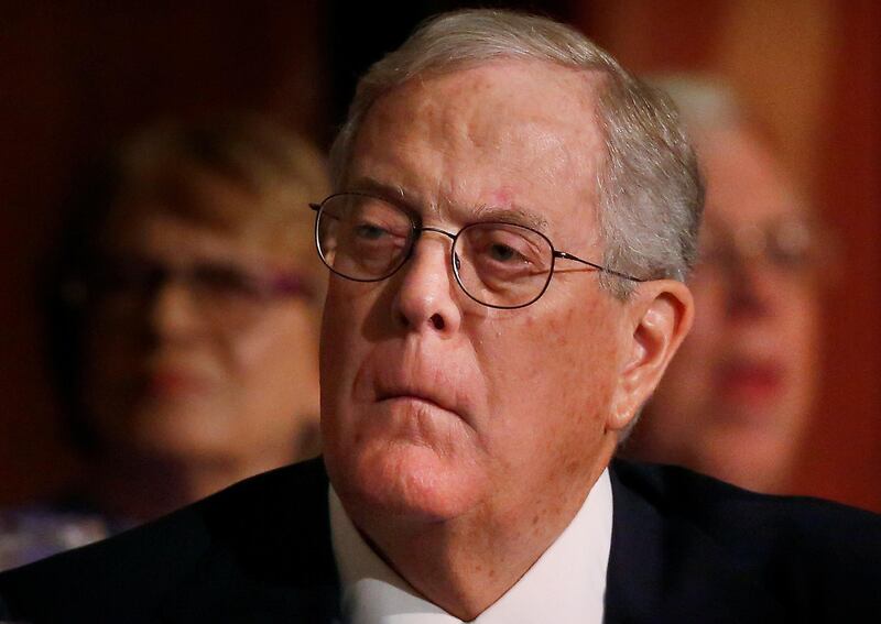 FILE PHOTO: David Koch, executive vice president of Koch Industries, attends an Economic Club of New York event in New York, December 10, 2012.  REUTERS/Brendan McDermid/File Photo
