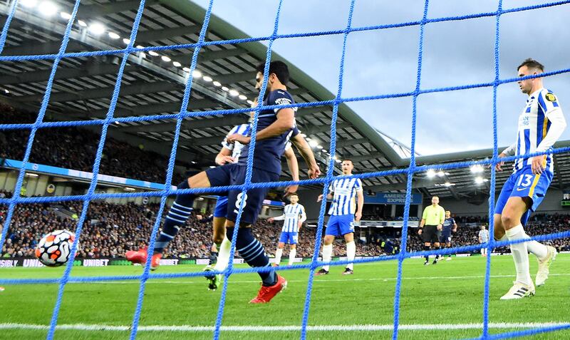 Manchester City's Ilkay Gundogan scores their first goal. Reuters