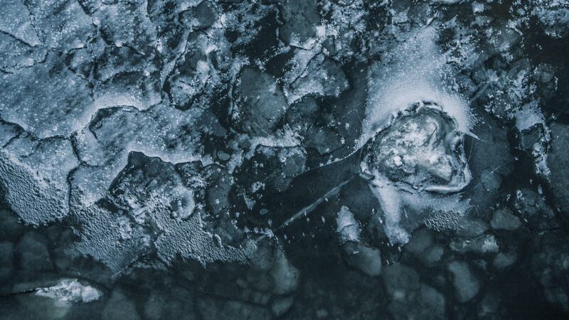 A 48,500-year-old 'zombie virus’ was found buried in a frozen lake in Russia. Photo: Unsplash