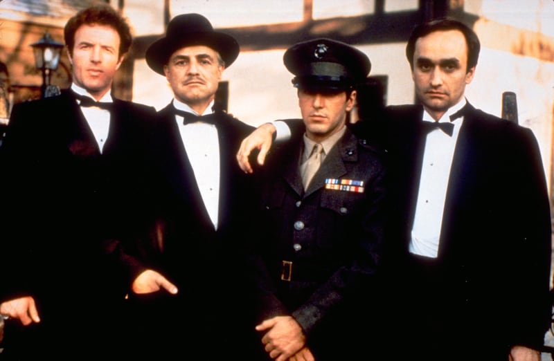 From left, James Caan as Sonny Corleone, Marlon Brando as Don Vito Corleone, Al Pacino as Michael Corleone and John Cazale as Fredo Corleone from the 1972 film 'The Godfather'. Paramount Pictures / AP