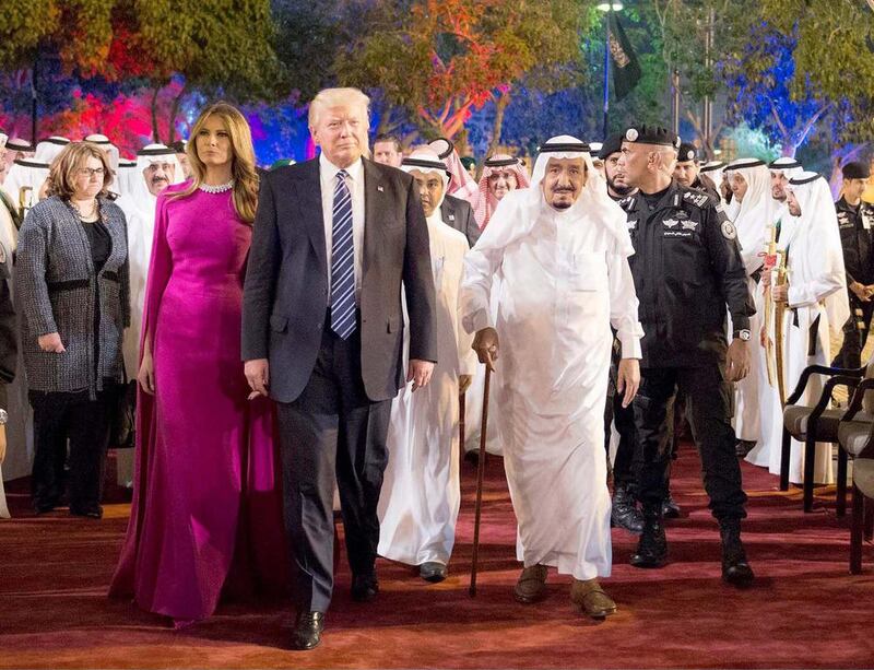 King Salman arrives at Murabba Palace with Mr Trump and the First Lady Melania Trump.  SPA / EPA