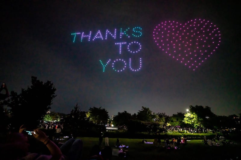 Hundreds of drones lit up the night sky in Seoul as the world battles the coronavirus pandemic. AFP