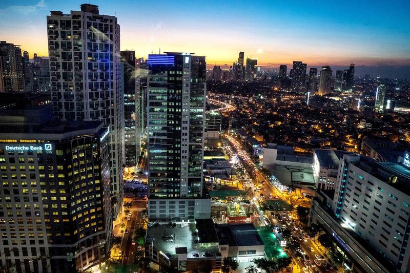 The Manila skyline. UAE-based Filipinos are confident about investing in the Philippines property market and the economic plans of the new government would seem to bear that out, real estate experts say. Sanjit Das / Bloomberg