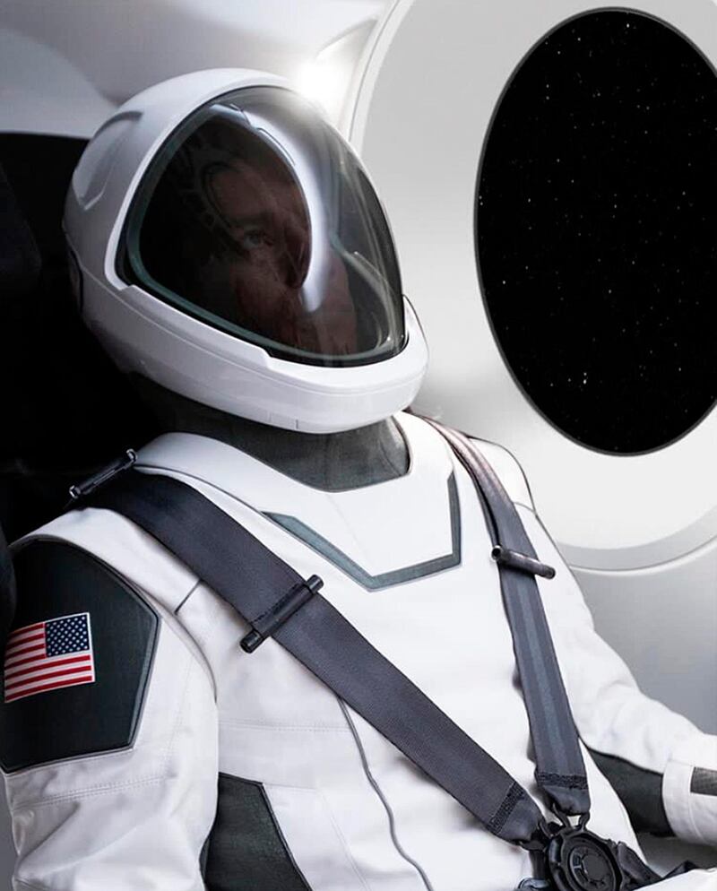 This undated image made available by Elon Musk on Wednesday, Aug. 23, 2017 shows a new spacesuit from his company SpaceX. It's designed for its crewed flights planned for 2018. (SpaceX via AP)