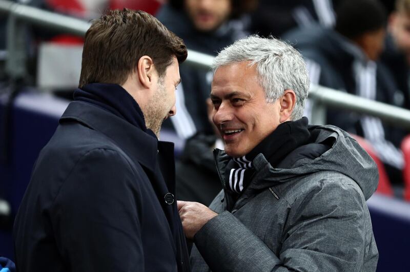 LONDON, ENGLAND - JANUARY 31: Jose Mourinho the head coach / manager of Manchester United is all smiles as he speaks with Mauricio Pochettino manager / head coach of Tottenham Hotspur before the Premier League match between Tottenham Hotspur and Manchester United at Wembley Stadium on January 31, 2018 in London, England. (Photo by Catherine Ivill/Getty Images)