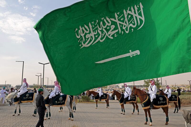 Saudi Royal Guard officers on horseback during National Day celebrations.