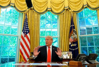 (FILES) In this file photo taken on September 4, 2019 US President Donald Trump updates the media on Hurricane Dorian preparedness from the Oval Office at the White House in Washington, DC. US President Donald Trump on September 9, 2019, tweeted that secret meetings that were to be held at Camp David with Taliban leaders and the Afghan president on Sunday had been cancelled following a bombing in Kabul last week.
 / AFP / JIM WATSON
