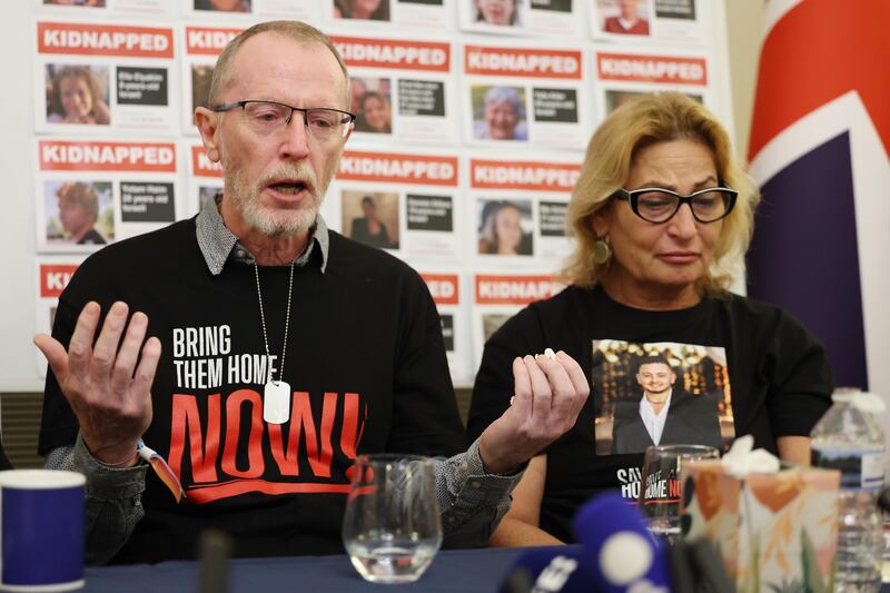 Thomas Hand (L) whose nine-year-old daughter Emily Hand is believed kidnapped by Hamas and Orit Meir (R) speak at a press conference of family members of Israeli hostages. EPA