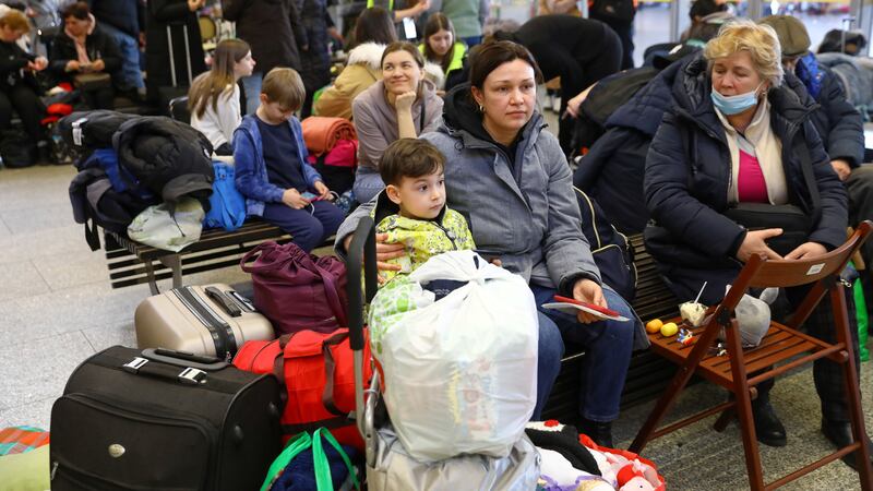 Refugees from Ukraine arrive at Warsaw East train station in Poland on Saturday. EPA