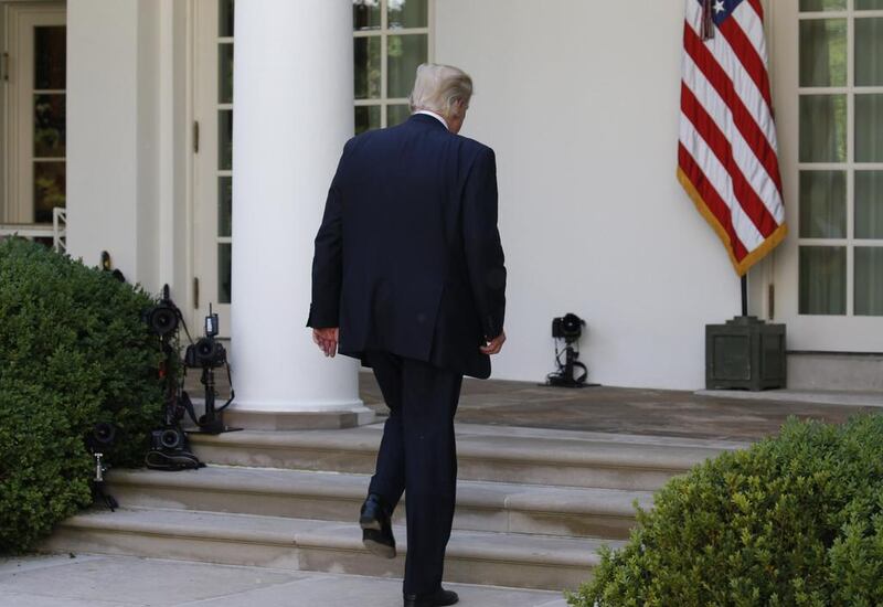 President Donald Trump departs after announcing his decision that the United States will withdraw from the Paris climate deal, in the Rose Garden of the White House, on June 1, 2017. Joshua Roberts / Reuters