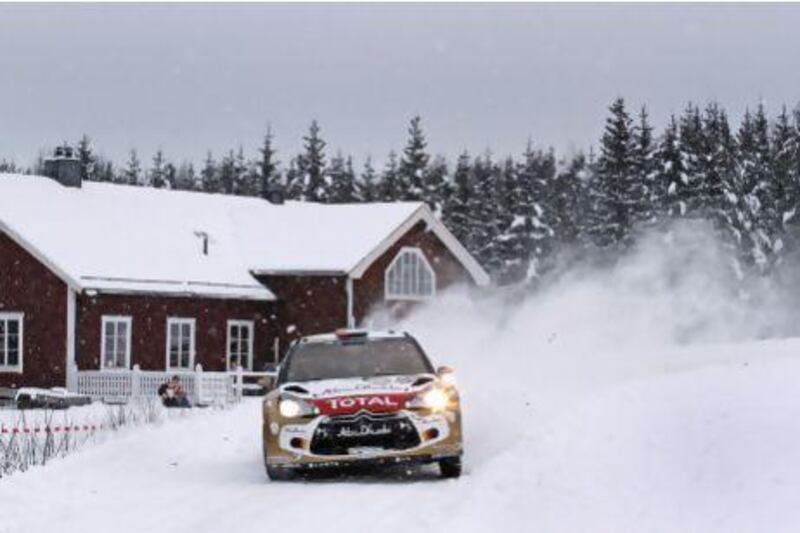 Sheikh Khalid Al Qassimi navigates through the snow at Rally Sweden on Friday. Photo by Andre Lavadinho