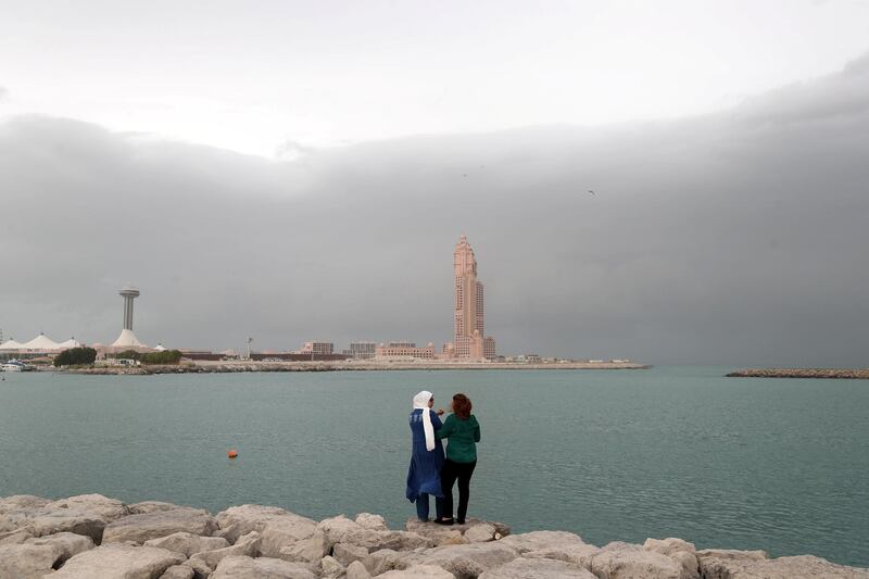 Abu Dhabi, United Arab Emirates - November 10, 2019: Dark clouds and rain batter the Abu Dhabi Coast. Sunday the 10th of November 2019. Abu Dhabi. Chris Whiteoak / The National